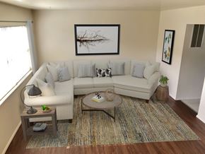 Rantoul apartment for rent - a living room with a couch and a coffee table