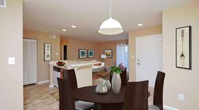 Charlotte apartment for rent - a dining room and kitchen with a table and chairs