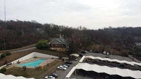 Nashville apartment for rent - a view of a pool and a building from a roof