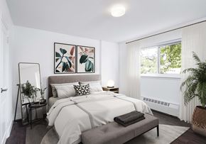 Toronto apartment for rent - Bedroom staged with a bed and artwork
