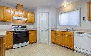 Grand Forks Afb apartment for rent - a kitchen with a stove and a sink