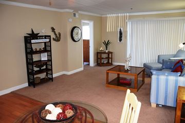 Slidell apartment for rent - a living room with a couch and a table