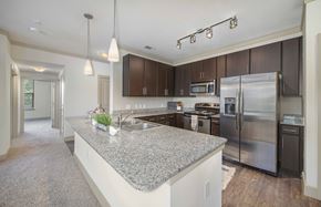 San Antonio apartment for rent - a kitchen with stainless steel appliances and granite counter tops