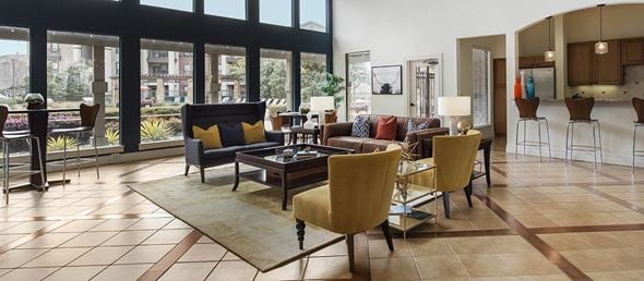 Frisco apartment for rent - a living room with a couch and chairs and a table