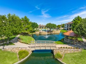 Roanoke apartment for rent - a bridge over a pond with a gazebo and a fountain