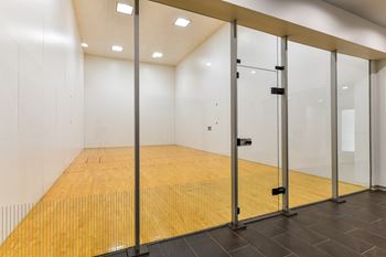 Invigorating game of racquetball in our indoor racquetball courts 