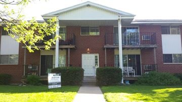 Thiensville apartment for rent - a house with a foreclosure sign in front of it