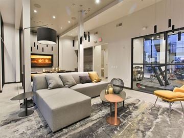 Scottsdale apartment for rent - a living room with a couch and a fireplace
