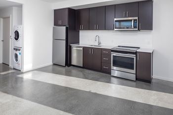 Contemporary stained concrete & laminate flooring*