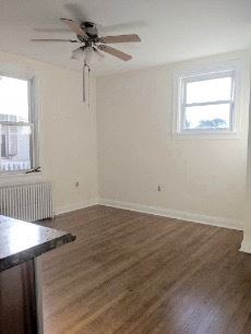 Emlenton apartment for rent - A room with a ceiling fan and a window.