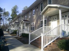 Blackstone apartment for rent - a row of houses with stairs and a sidewalk