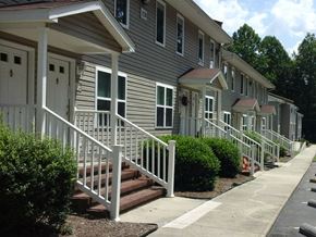 Blackstone apartment for rent - a row of houses with stairs and a sidewalk