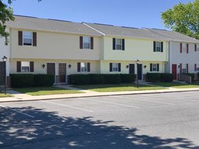 Snow Hill apartment for rent - Apartment building with a parking lot in front.