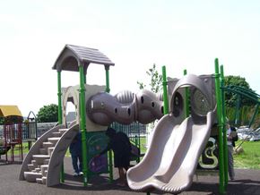 Smyrna apartment for rent - A playground with a slide and a play structure.