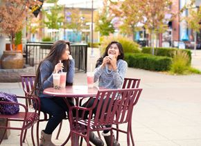 Saxonburg apartment for rent - two women sitting at a table eating ice cream