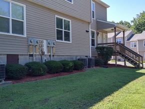 Lawrenceville apartment for rent - the front of a house with a yard and a staircase
