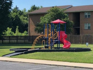 Martinsburg apartment for rent - a playground in a yard in front of a house