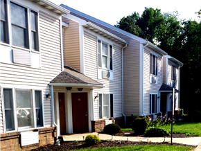Finleyville apartment for rent - A row of houses with a red door in the front.