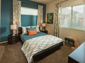 Chandler apartment for rent - a bedroom with a bed and two windows