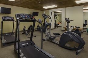 Burlington apartment for rent - A gym with treadmills and exercise equipment.