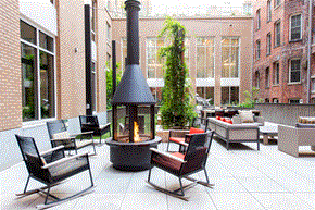 Washington apartment for rent - an outdoor patio with chairs and a fire pit