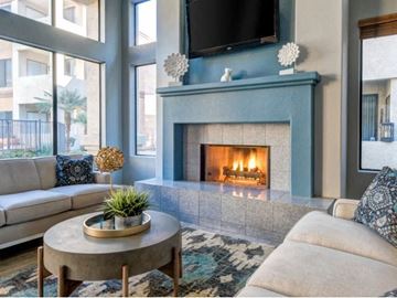 Phoenix apartment for rent - a living room with a fireplace and a couch