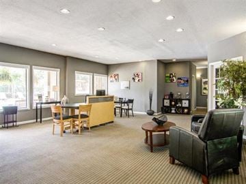 Sandy Springs apartment for rent - a living room and dining room with a table and chairs