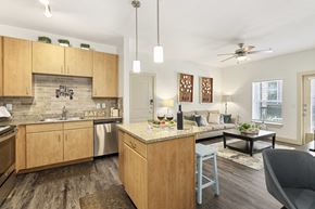 Cypress apartment for rent - A kitchen with a dining table and chairs.