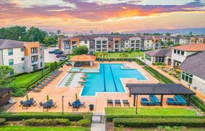 Houston apartment for rent - an aerial view of the pool at sunset at the resort at governors crossing