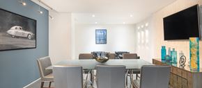 Greenville apartment for rent - a dining room with a glass table and chairs