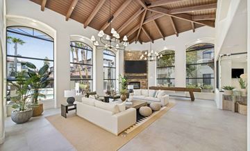 Scottsdale apartment for rent - a living room with white furniture and large windows
