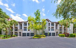 Coral Springs apartment for rent - an empty parking lot in front of an apartment building