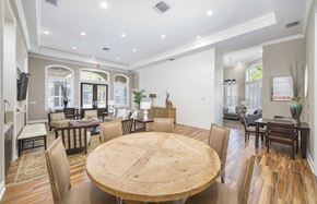 Palm Harbor apartment for rent - a dining room with a wooden table and chairs