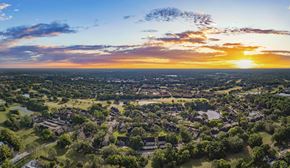Tampa apartment for rent - an aerial view of the city at sunset