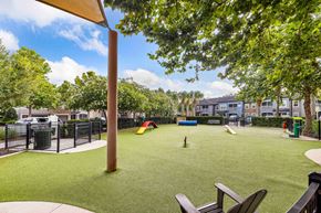 Lake Mary apartment for rent - a yard with a playground and a dog park