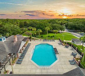 Gainesville apartment for rent - an aerial view of the pool at sunset at the resort at longboat key club