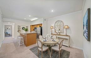 Charleston apartment for rent - a dining room and kitchen with a table and chairs