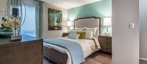 Charleston apartment for rent - a bedroom with a bed and a dresser