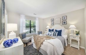 Mt Pleasant apartment for rent - a bedroom with a large bed and a window