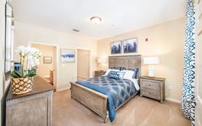 Summerville apartment for rent - a bedroom with a bed and a dresser