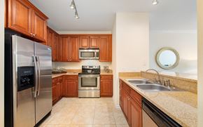 Jacksonville apartment for rent - a kitchen with stainless steel appliances and granite counter tops