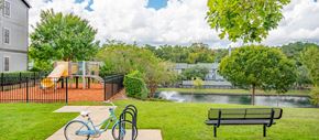 Tallahassee apartment for rent - a park with a playground and a pond