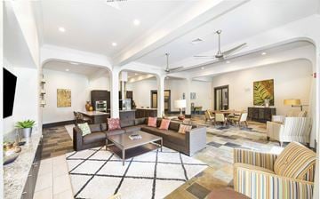 Pooler apartment for rent - A living room with a variety of furniture including a sofa, armchairs, and a coffee table.