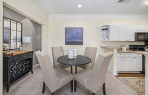 Charlotte apartment for rent - a dining room and kitchen with a table and chairs