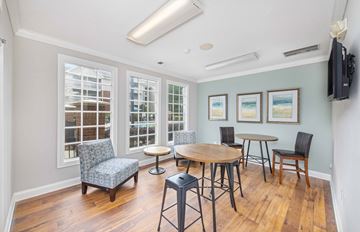Charlotte apartment for rent - a living room with a table and chairs and a tv