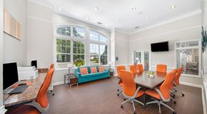 Chesapeake apartment for rent - a conference room with a table and chairs and a large window