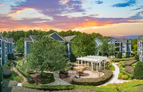Chesapeake apartment for rent - an aerial view of a building with trees and a patio and a courtyard