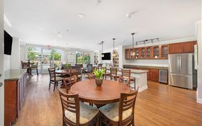 Charlottesville apartment for rent - a dining room and kitchen with a table and chairs