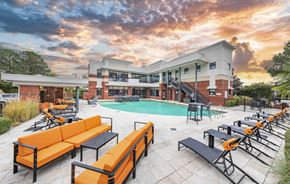 Newport News apartment for rent - the pool at the residence at sunset with a cloudy sky