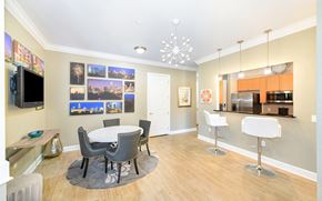 Charlotte apartment for rent - a dining room and kitchen with a table and chairs
